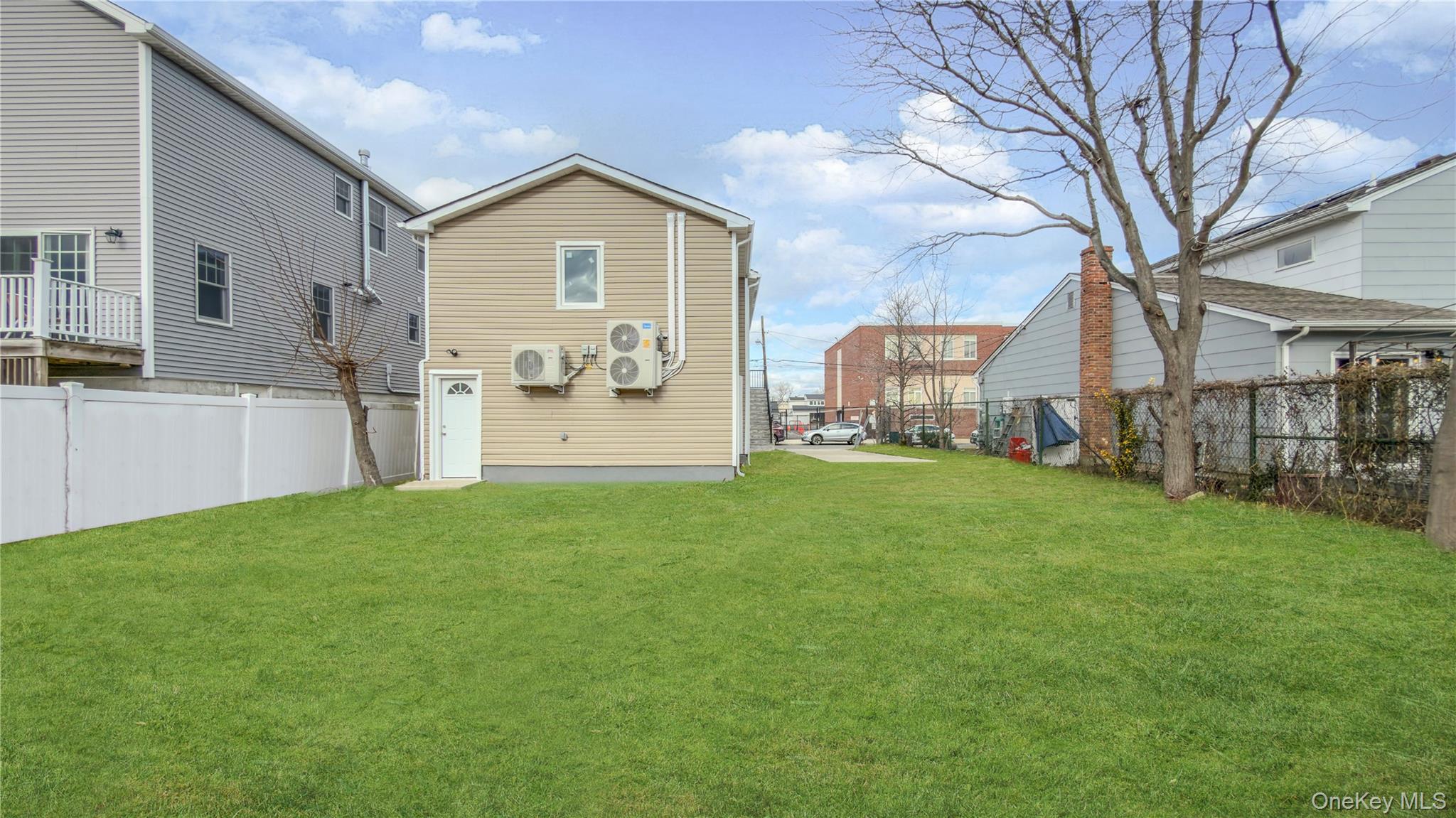 37 Deal Road Island Park, NY 11558 - Photo 48 of 50 Back of property featuring a fenced backyard