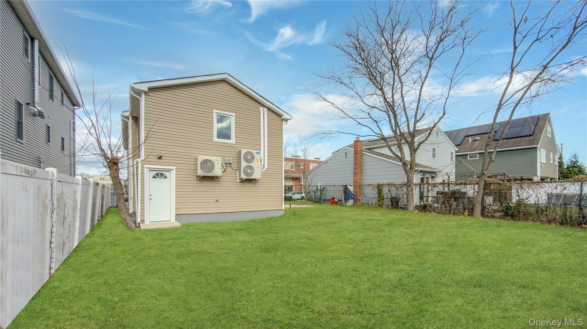 37 Deal Road Island Park, NY 11558 - Photo 49 of 50 Back of house with a fenced backyard