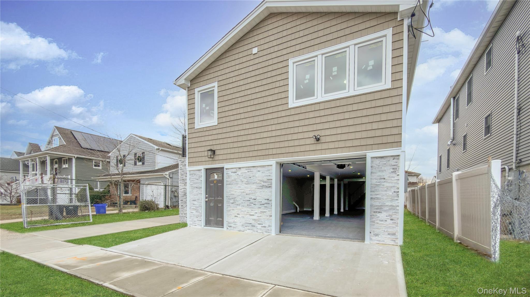 37 Deal Road Island Park, NY 11558 - Photo 9 of 50 View of front facade