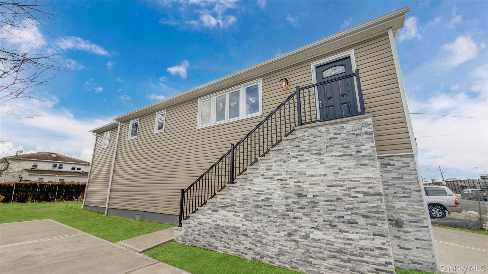 37 Deal Road Island Park, NY 11558 - Photo 10 of 50 View of front of property featuring stairway