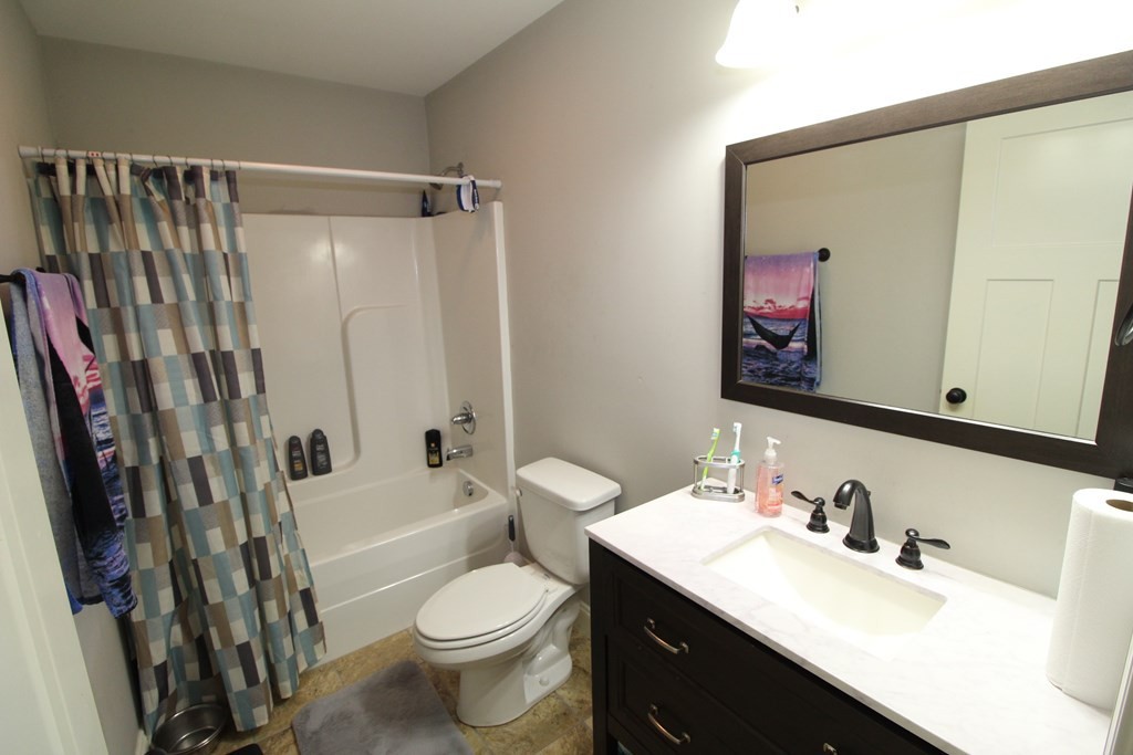 1348 Weeks Drive Northeast Cleveland, TN 37312 - Photo 14 of 25 a bathroom with a sink toilet and shower