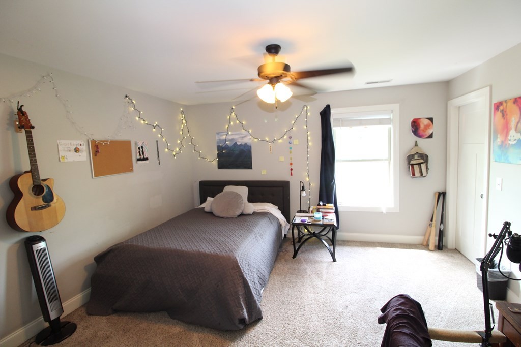 1348 Weeks Drive Northeast Cleveland, TN 37312 - Photo 15 of 25 a bedroom with a bed and a chandelier