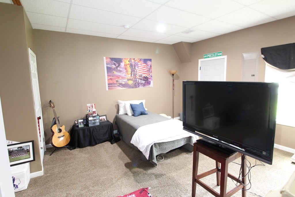 1348 Weeks Drive Northeast Cleveland, TN 37312 - Photo 22 of 25 a living room with furniture and a flat screen tv