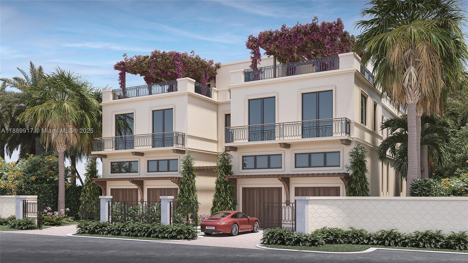 1009 Fisher Island Drive Fisher Island, FL 33109 - Photo 20 of 35 a front view of a residential apartment building with a yard