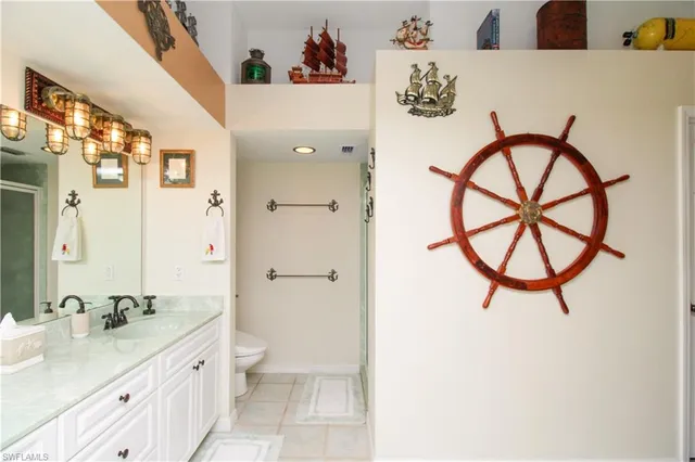 a view of a dining room with furniture large windows and wooden floor