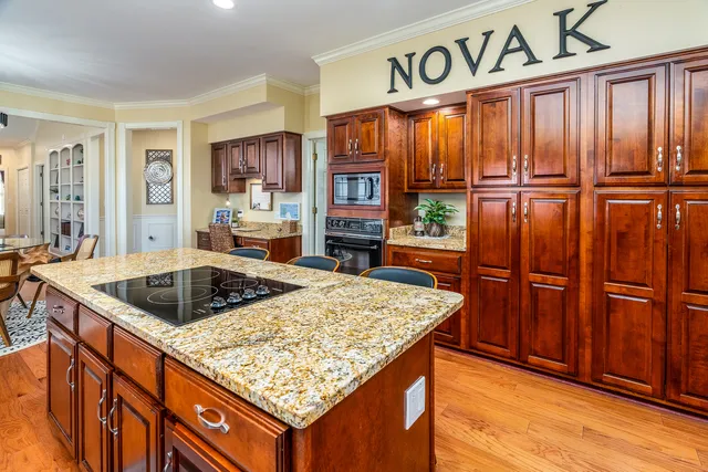 a bathroom with a toilet a sink and a mirror