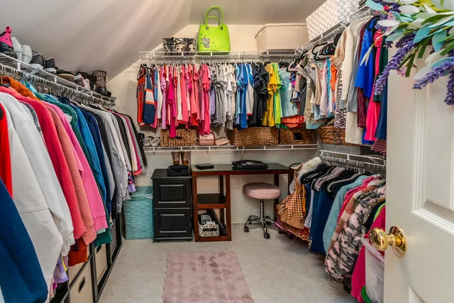 a view of backyard with seating space and trees