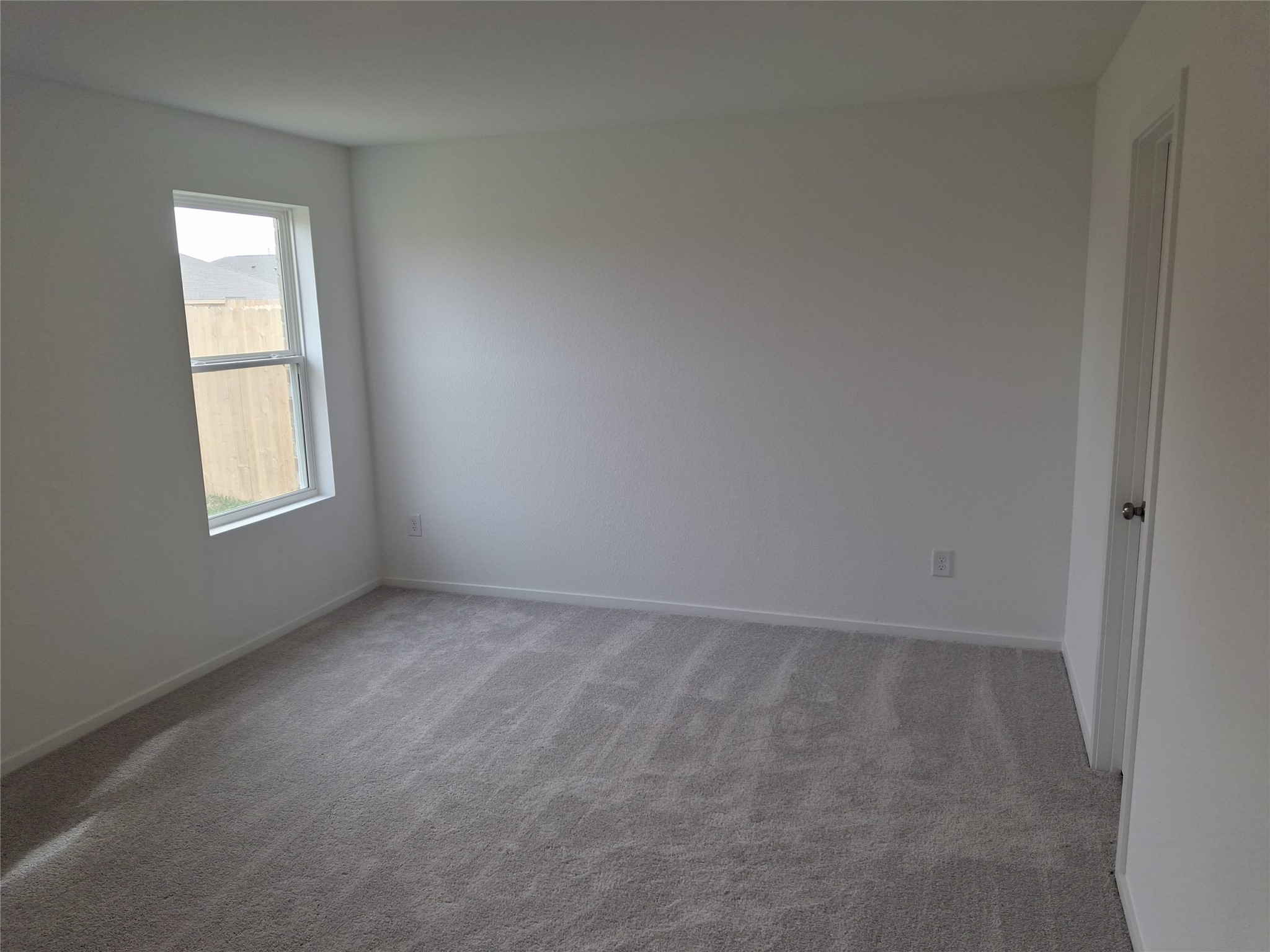 16126 Rustic Prairie Drive Grand Prairie, TX 75050 - Photo 14 of 17 an empty room with windows