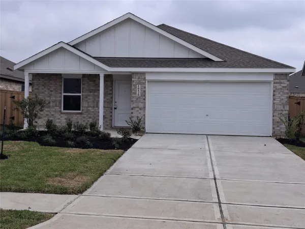 a front view of house with garage