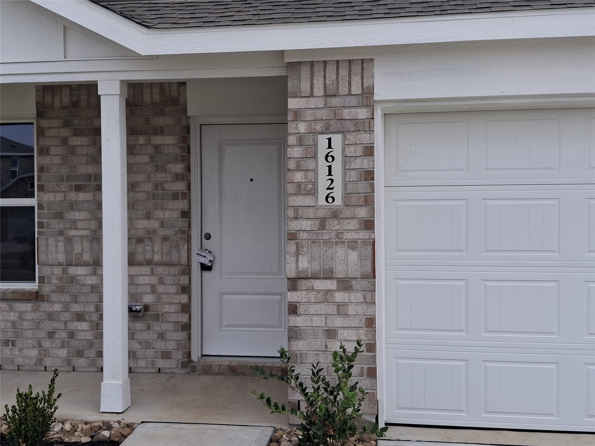 16126 Rustic Prairie Drive Grand Prairie, TX 75050 - Photo 3 of 17 a front view of a house with white walls