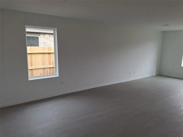 a kitchen with a refrigerator stove and microwave