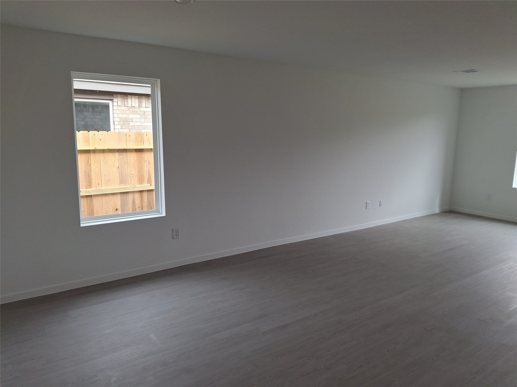 16126 Rustic Prairie Drive Grand Prairie, TX 75050 - Photo 10 of 17 an empty room with a window
