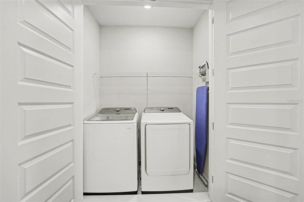 7841 Spectrum Drive Reunion, FL 34747 - Photo 12 of 30 a utility room with dryer and washer