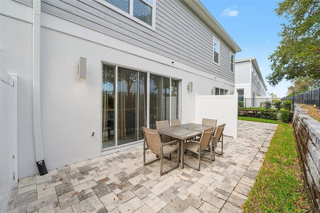 7841 Spectrum Drive Reunion, FL 34747 - Photo 25 of 30 a view of a house with backyard and sitting area