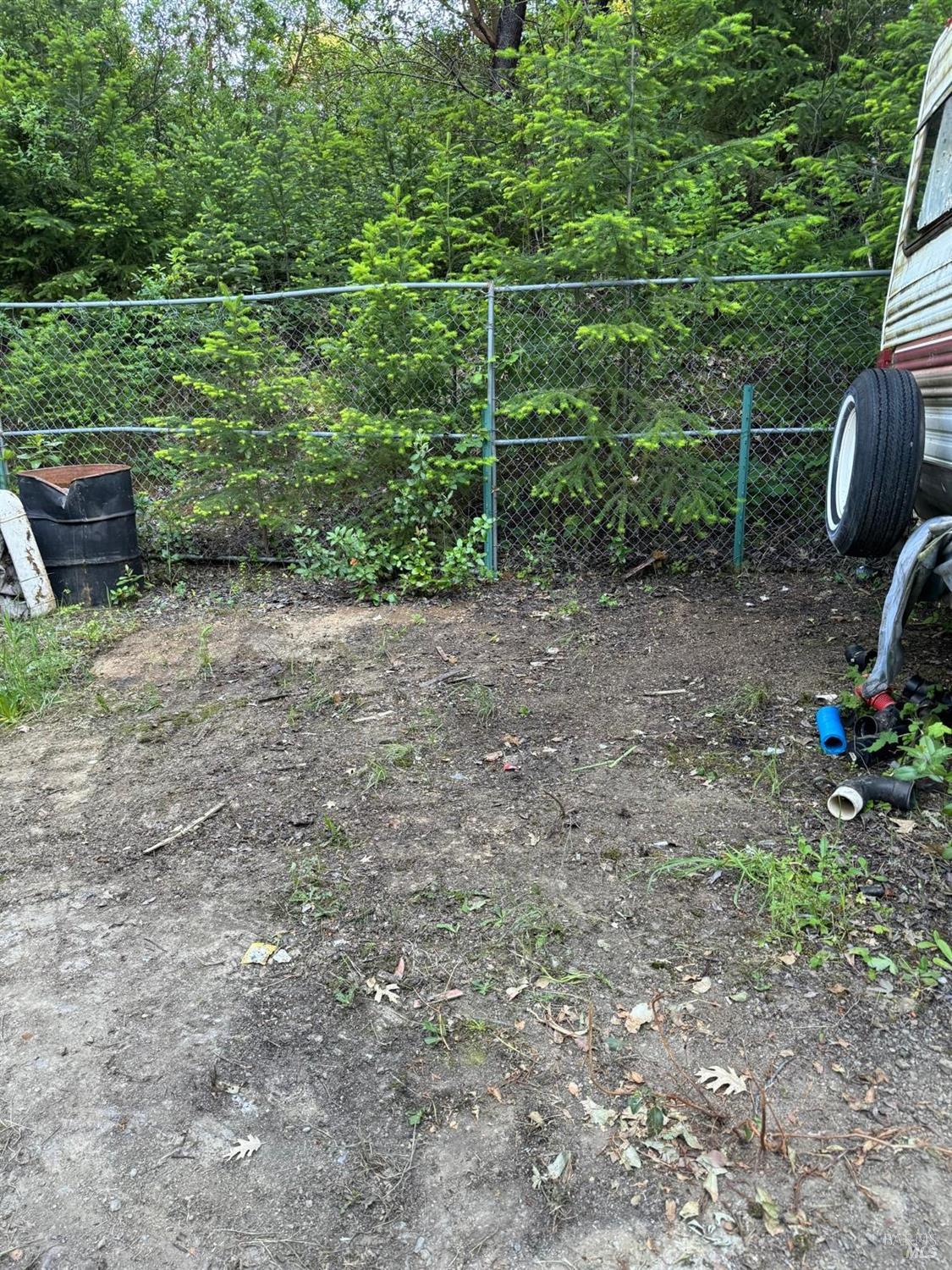 78577 Mina Road Covelo, CA 95428 - Photo 20 of 27 a view of a yard with a tree