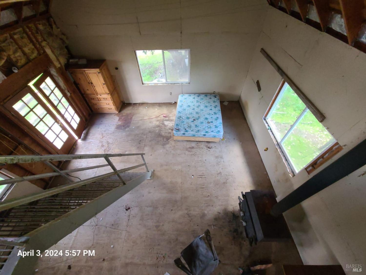 78577 Mina Road Covelo, CA 95428 - Photo 22 of 27 a view of an empty room and window
