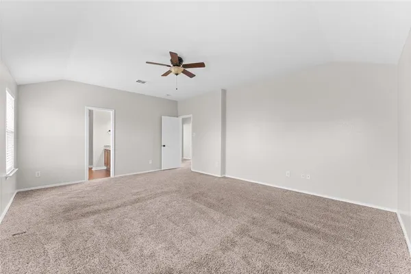 a view of a big room with carpet