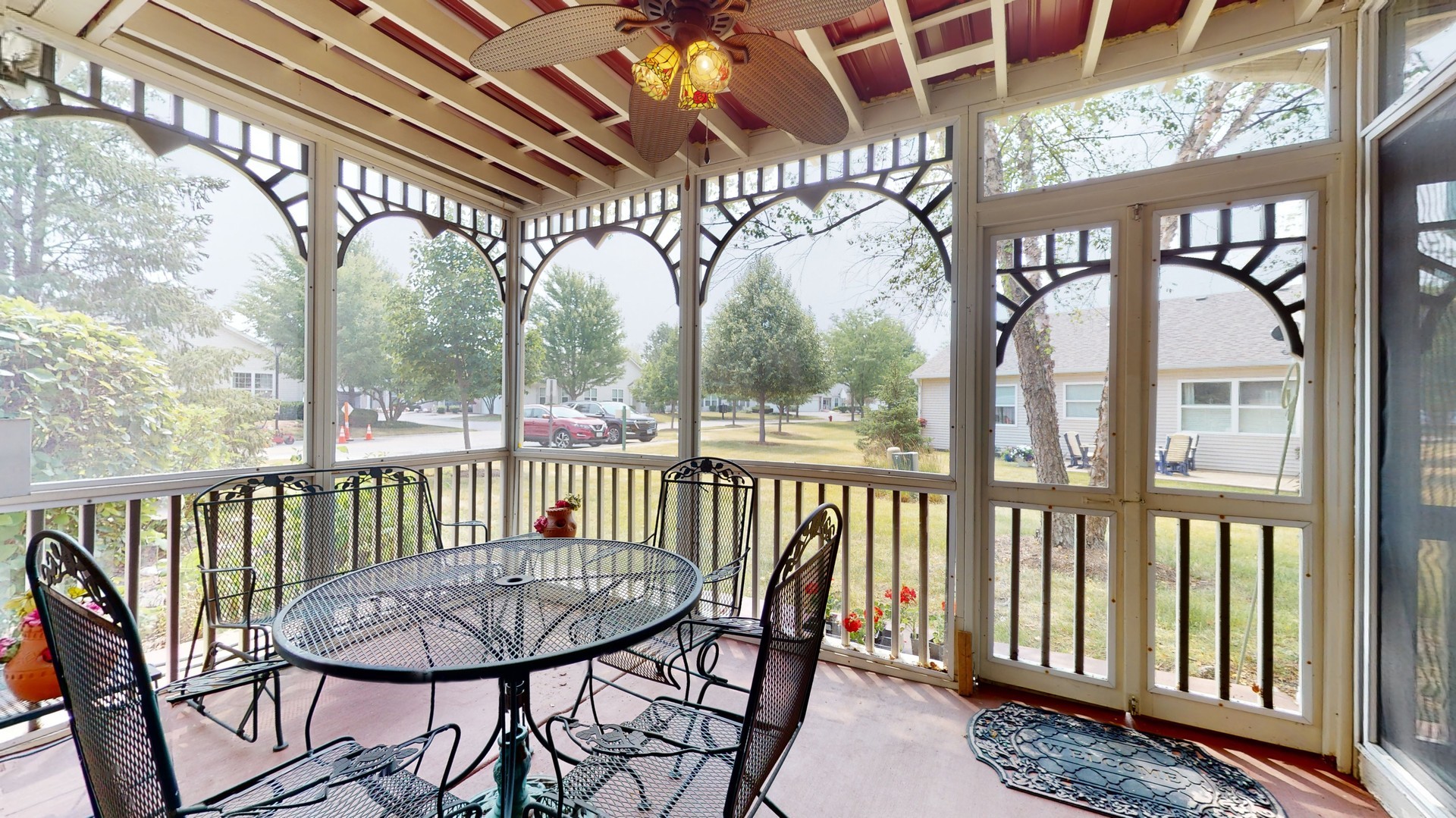 1540 Cadillac Circle Romeoville, IL 60446 - Photo 17 of 32 a view of a chair and tables in the balcony