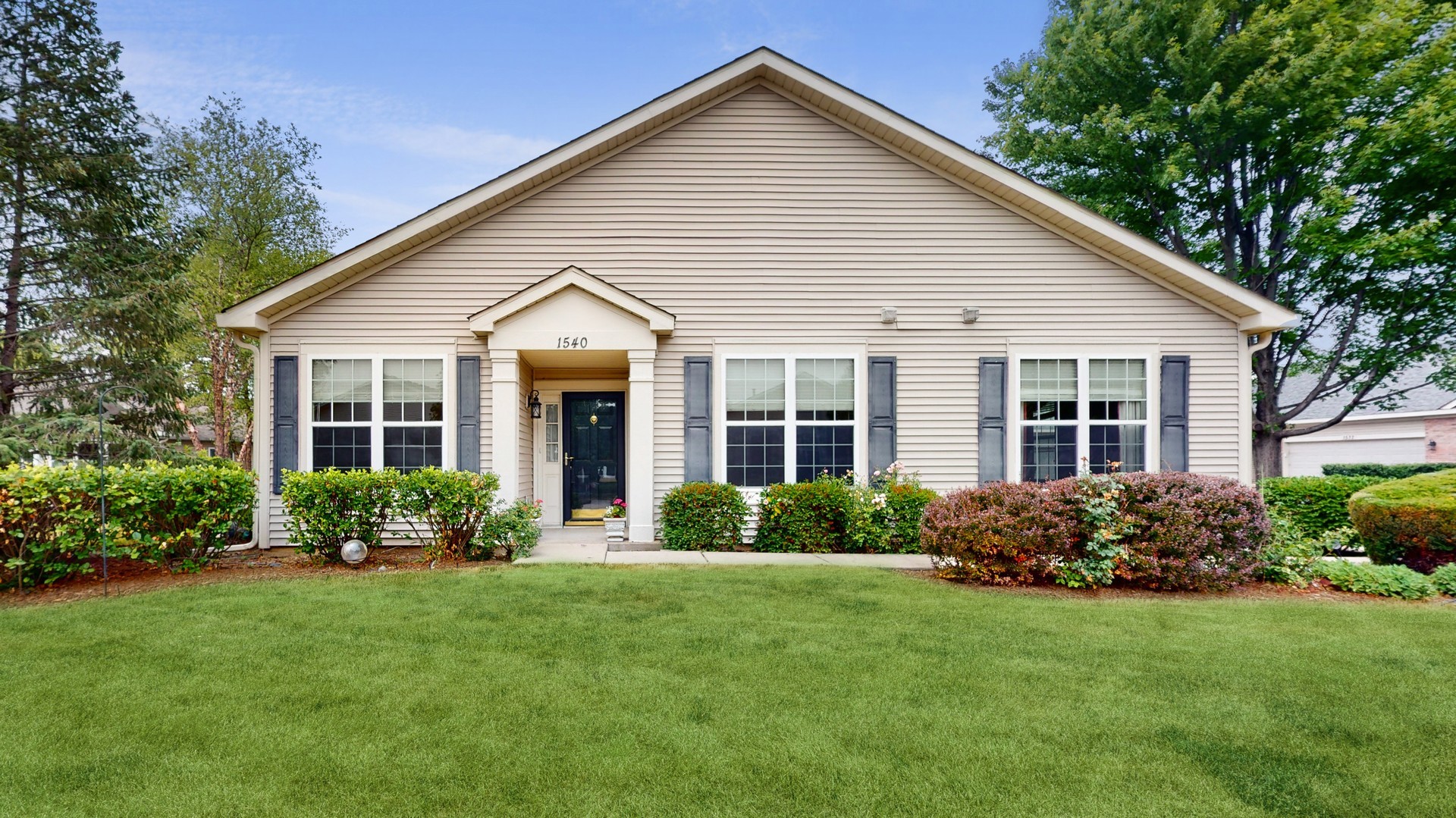 1540 Cadillac Circle Romeoville, IL 60446 - Photo 2 of 32 a view of a house with garden and yard