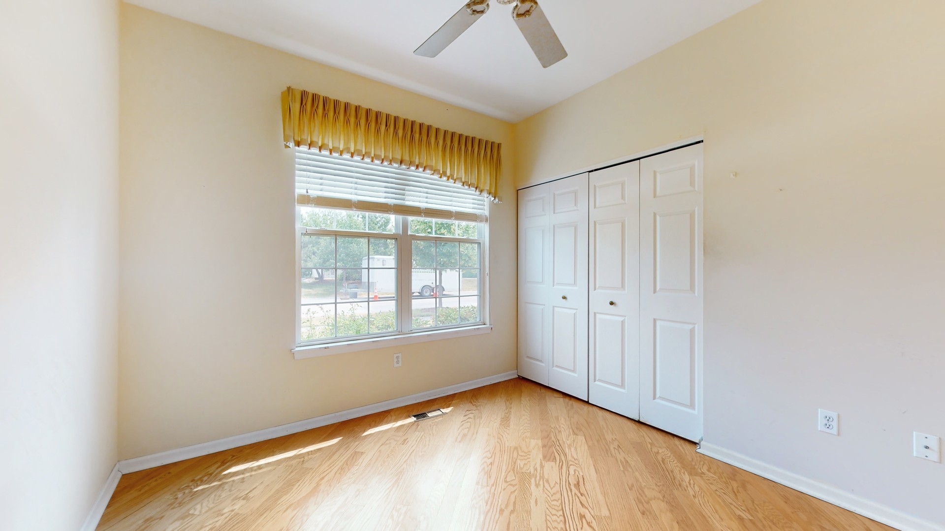 1540 Cadillac Circle Romeoville, IL 60446 - Photo 25 of 32 a view of an empty room with a window