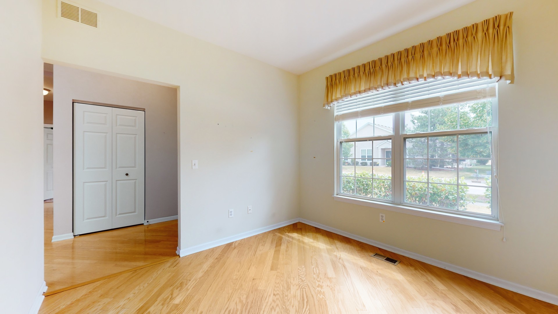 1540 Cadillac Circle Romeoville, IL 60446 - Photo 27 of 32 a view of an empty room and window