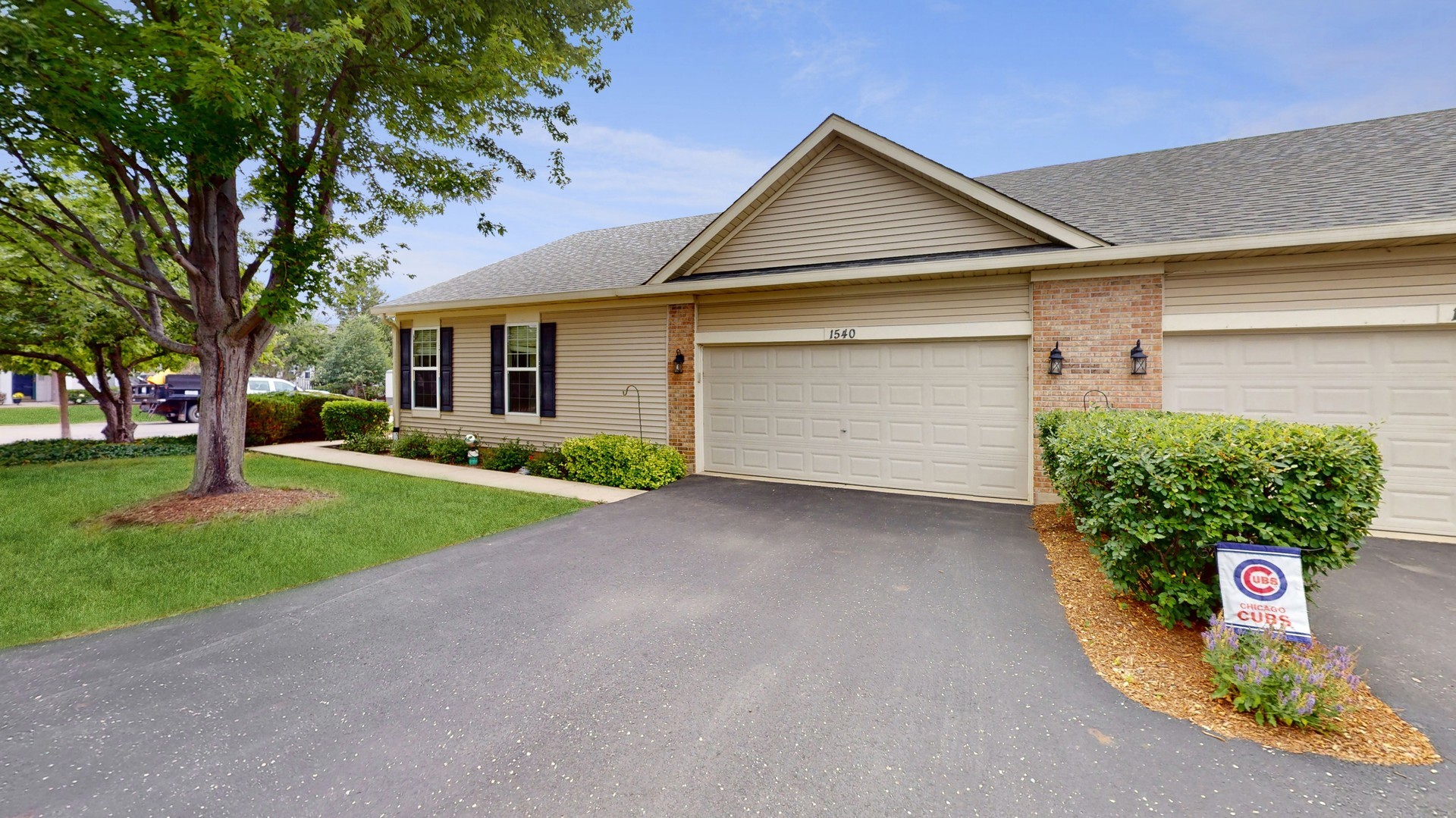 1540 Cadillac Circle Romeoville, IL 60446 - Photo 31 of 32 a view of a house with a yard
