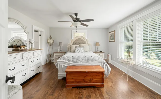 a view of living room with furniture and a large window