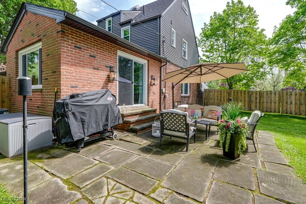 2340 Canterbury Road University Heights, OH 44118 - Photo 15 of 29 View of patio featuring a grill, outdoor lounge area, fence, and entry steps