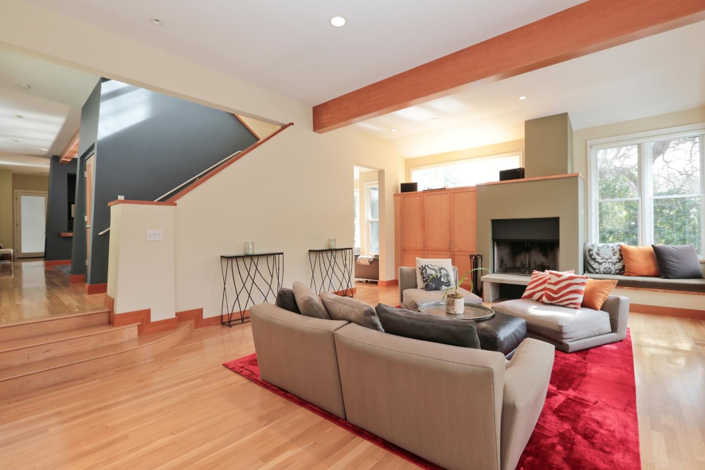 203 Miramontes Road Woodside, CA 94062 - Photo 6 of 8 a living room with furniture fireplace and a large window
