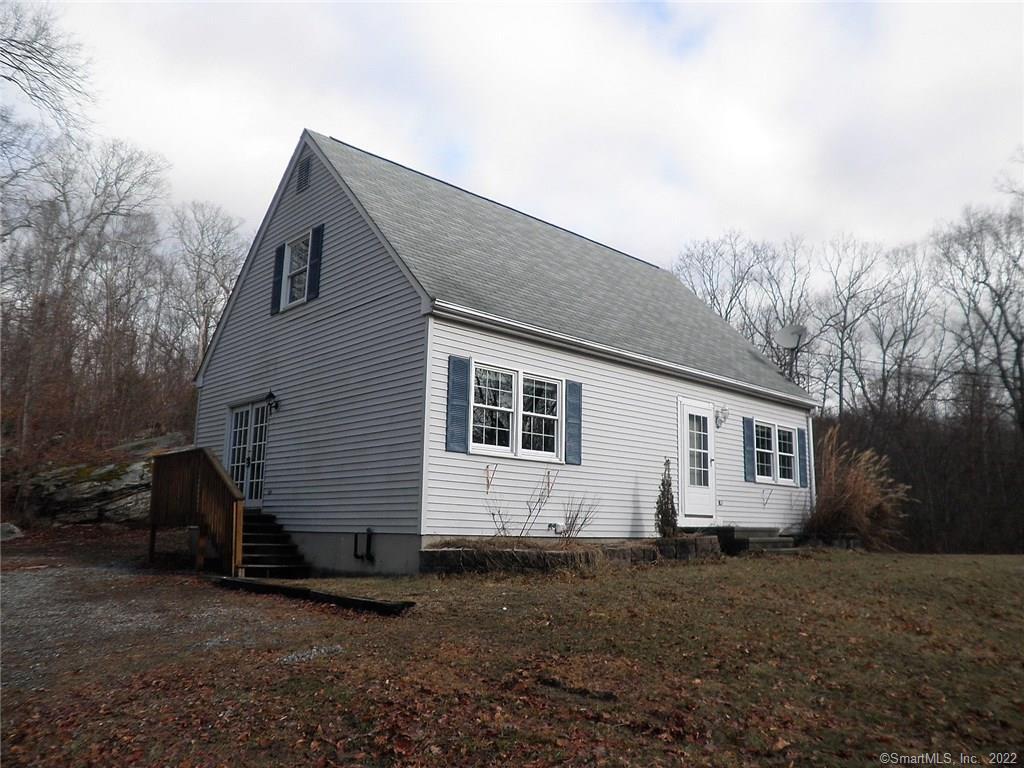 32 Coal Pit Hill Road Griswold, CT 06351 - Photo 1 of 1 a view of a house with backyard