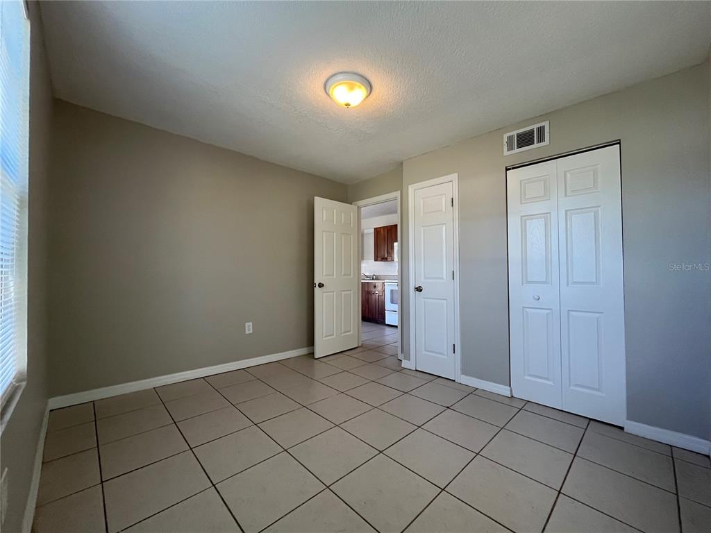 8546 Cameo Drive New Port Richey, FL 34654 - Photo 19 of 20 a view of an empty room and window