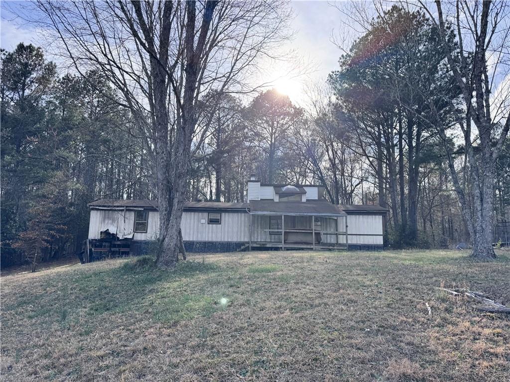80 Pine Needle Trail Southeast Cartersville, GA 30121 - Photo 1 of 10 a view of a house with a back yard