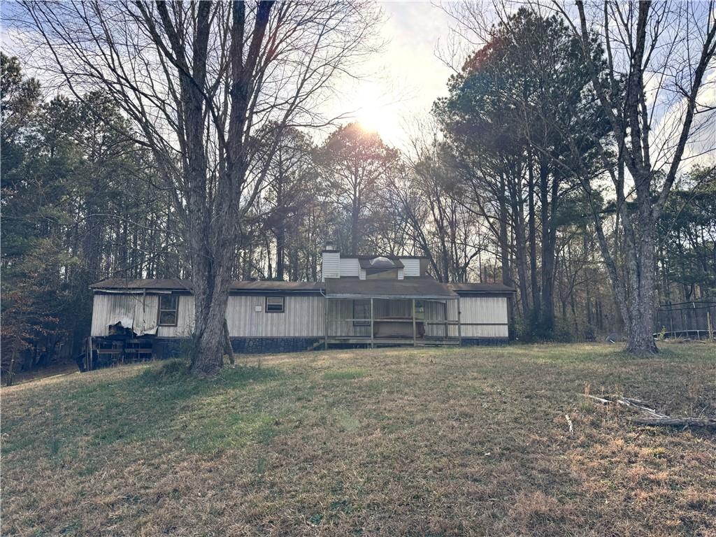80 Pine Needle Trail Southeast Cartersville, GA 30121 - Photo 6 of 10 a view of a house with a yard