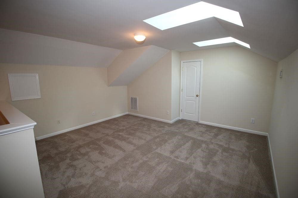 6952 Middleboro Drive Raleigh, NC 27612 - Photo 24 of 32 3rd floor bonus with skylights, ideal for home office or gym. 3rd Floor Bonus