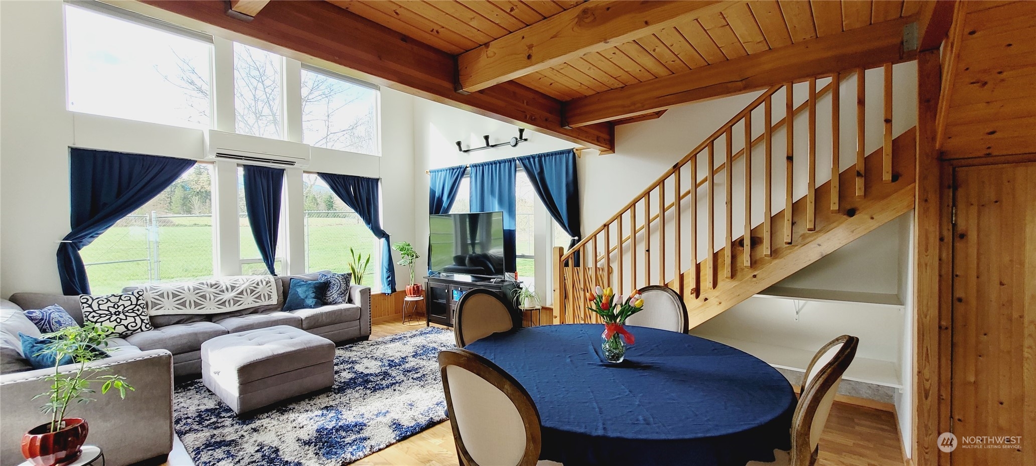 344 Atterberry Road Sequim, WA 98382 - Photo 11 of 40 a view of a livingroom with furniture window and wooden floor