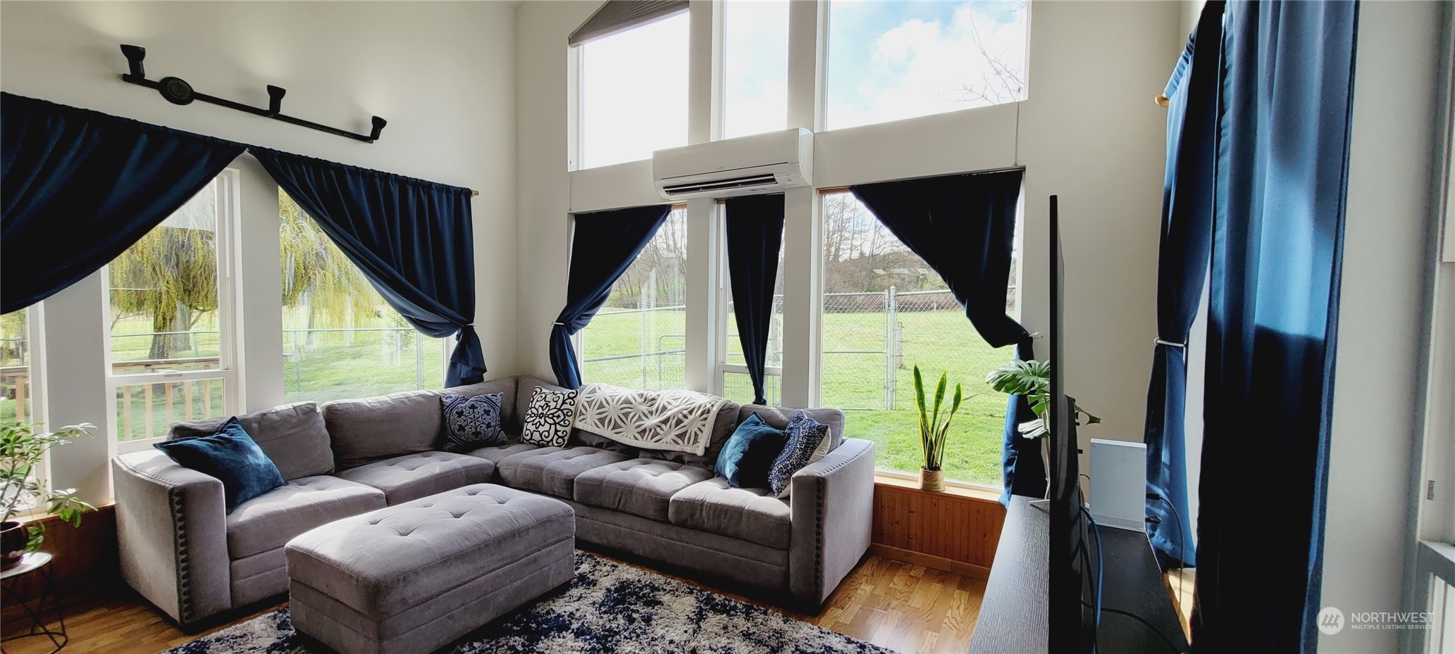 344 Atterberry Road Sequim, WA 98382 - Photo 12 of 40 a living room with furniture and a large window