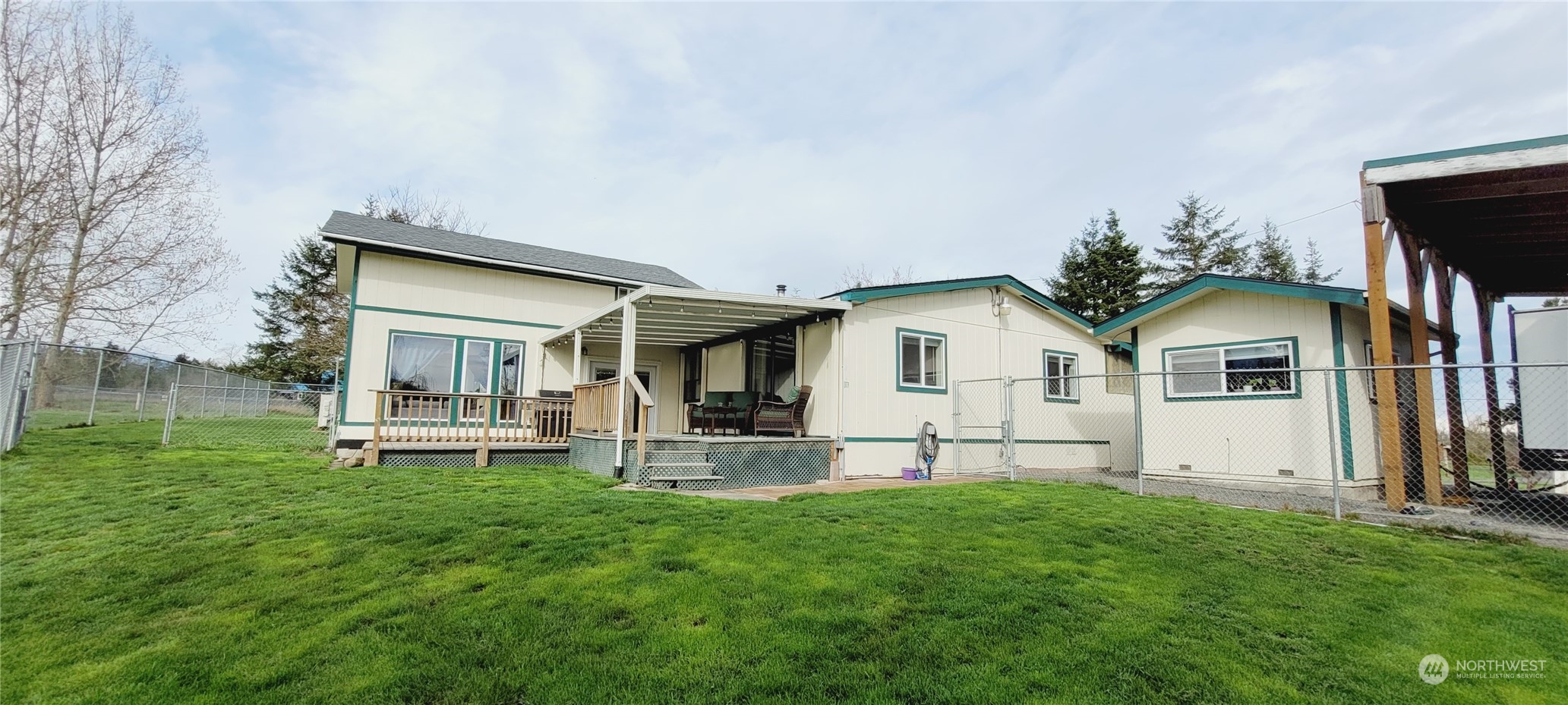 344 Atterberry Road Sequim, WA 98382 - Photo 36 of 40 a front view of house with yard and outdoor seating