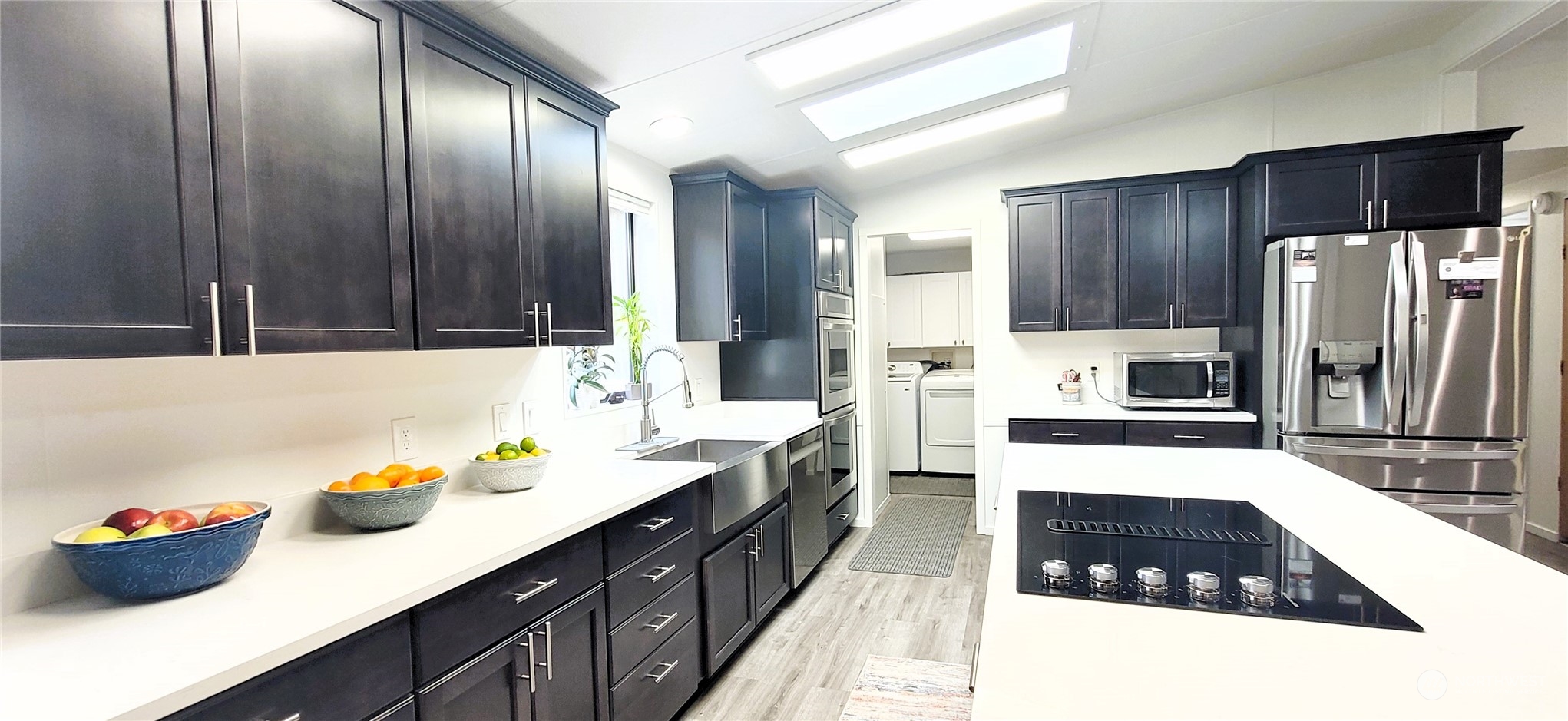 344 Atterberry Road Sequim, WA 98382 - Photo 6 of 40 a kitchen with granite countertop stainless steel appliances a sink counter space and cabinets