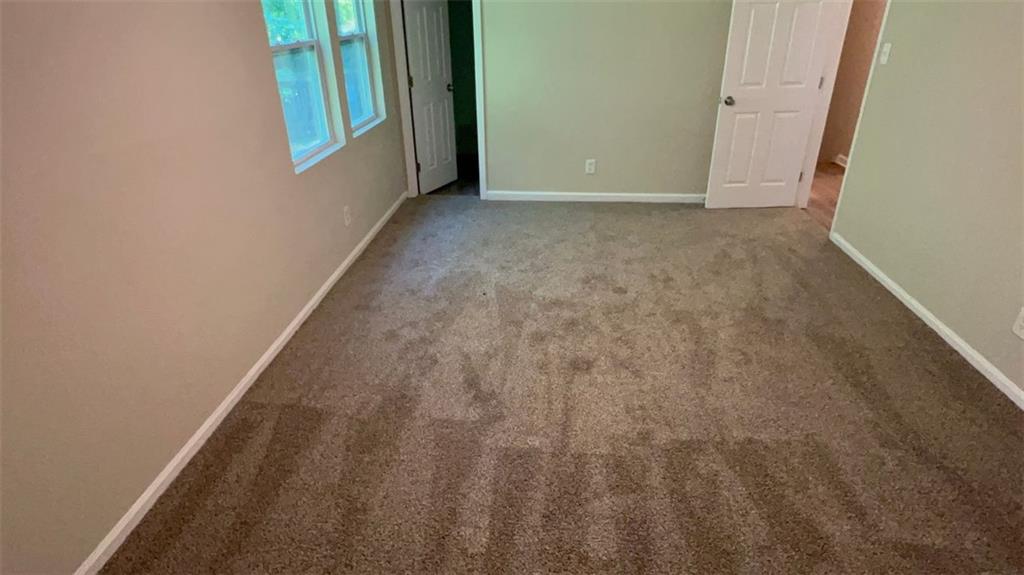 3766 Chimney Ridge Court Ellenwood, GA 30294 - Photo 3 of 9 a view of an empty room and window