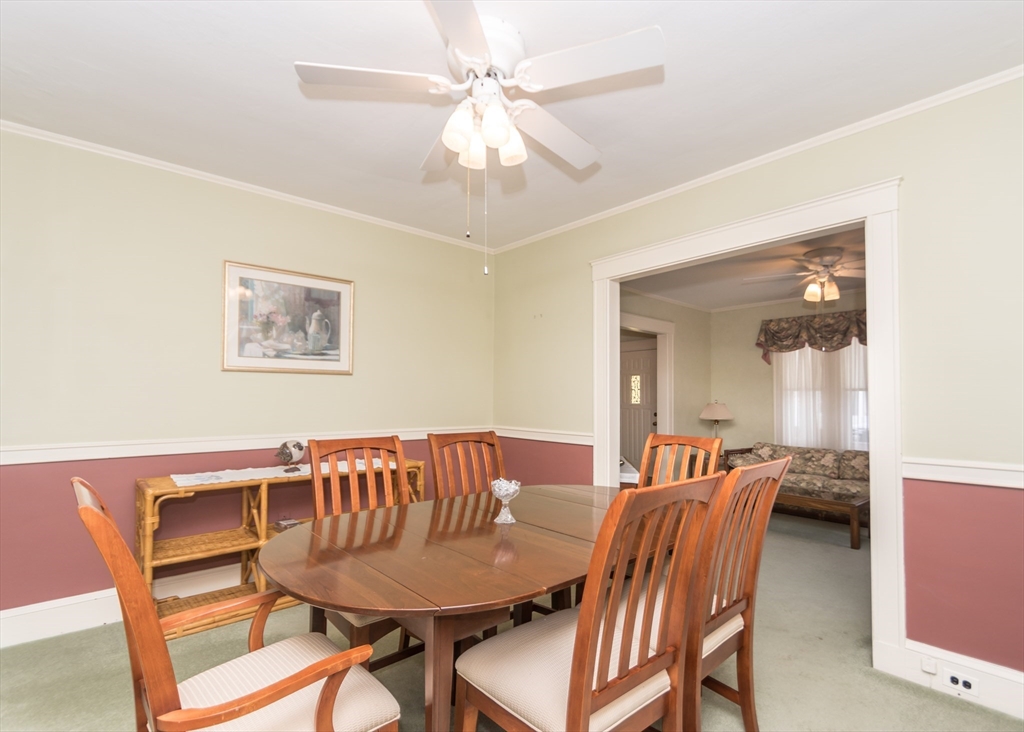 279-281 Ash Street Waltham, MA 02453 - Photo 11 of 39 a view of a dining room with furniture