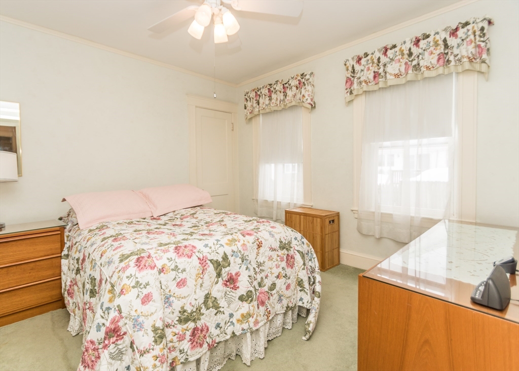 279-281 Ash Street Waltham, MA 02453 - Photo 16 of 39 a bedroom with a bed and a window in it