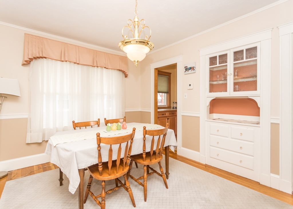 279-281 Ash Street Waltham, MA 02453 - Photo 28 of 39 a dining room with furniture and window