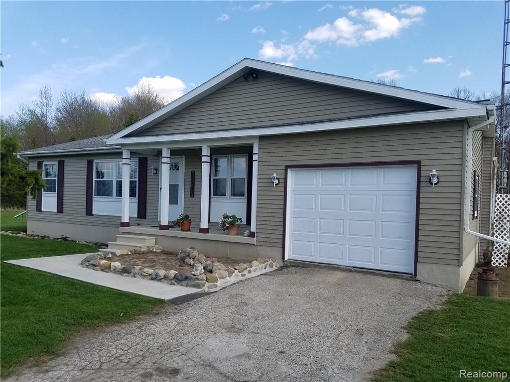 8218 Shipman Road Corunna, MI 48817 - Photo 1 of 26 front of house.jpg