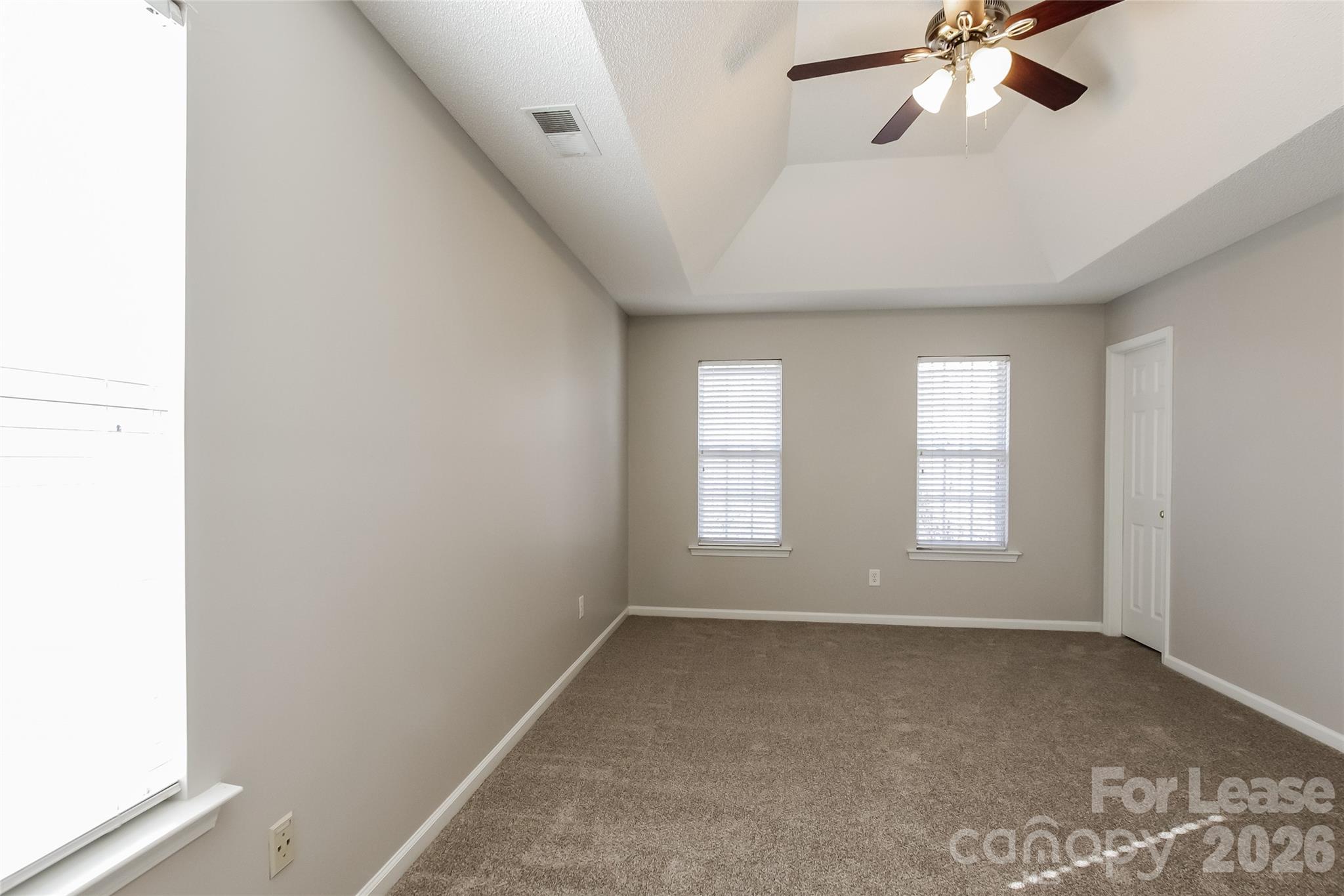 10802 Gold Pan Road Charlotte, NC 28215 - Photo 9 of 15 a view of an empty room with a window