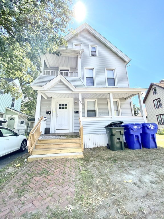 185 King Street Springfield, MA 01109 - Photo 1 of 5 a front view of a house with a yard