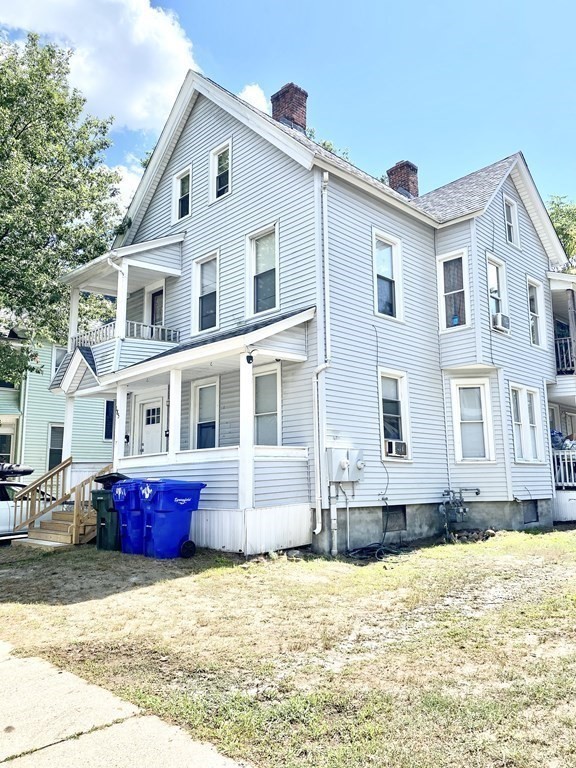 185 King Street Springfield, MA 01109 - Photo 2 of 5 a front view of a house with a yard