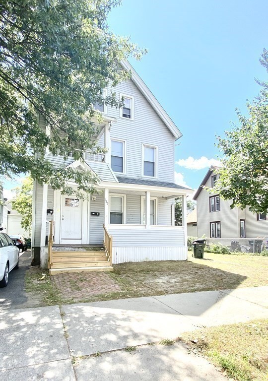 185 King Street Springfield, MA 01109 - Photo 3 of 5 a front view of a house with a yard