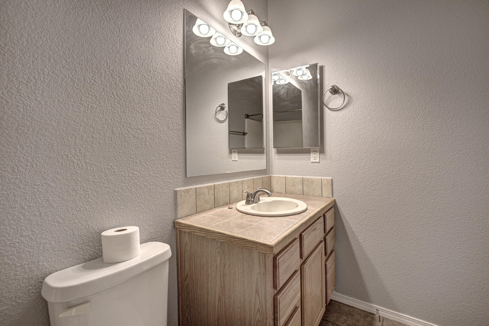 334 East Cedar Mill Road Star Valley, AZ 85541 - Photo 24 of 32 a bathroom with a sink and a mirror