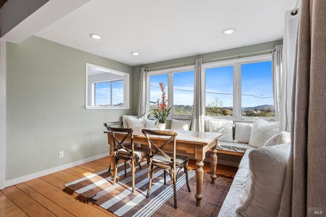 a kitchen with stainless steel appliances granite countertop a stove and a refrigerator