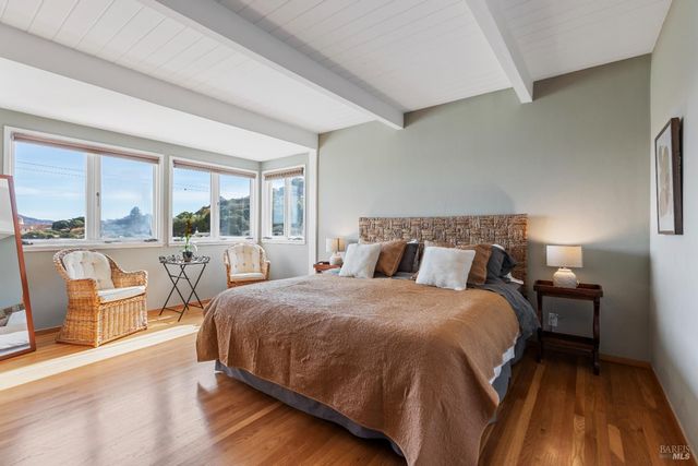 a bedroom with a bed and closet